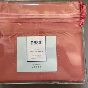 NWT Twin sheet set- orange/peach color. Amazon brand: NESTL